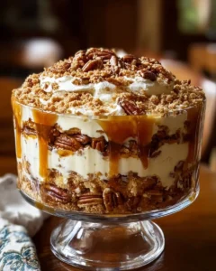 Delicious Pecan Pie Cheesecake Trifle layered with creamy cheesecake and pecans.