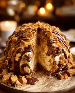 Delicious Reese's cheese ball dessert with peanut butter and chocolate toppings
