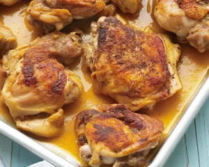 Baked boneless skinless chicken thighs with spices ready for a quick meal