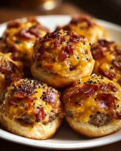 Bacon cheeseburger bombs, toasted and oozing with cheese and bacon