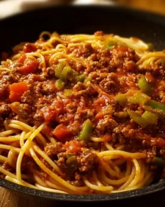 Delicious stovetop spaghetti meat sauce simmering in a pot