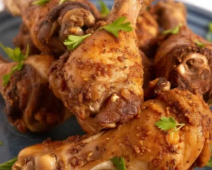 Deliciously seasoned oven-baked chicken legs cooked to perfection.