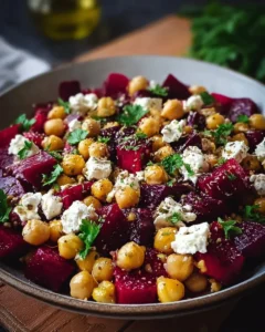Chickpea, Beet, and Feta Salad with Lemon-Garlic Vinaigrette on a plate