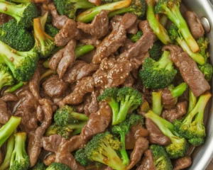 Delicious beef and broccoli stir-fry with garlic and soy sauce served in a bowl.