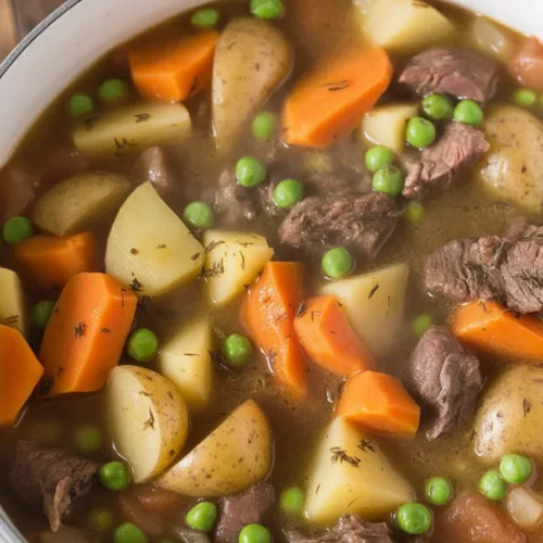 Homemade beef stew with tender meat and vegetables simmered in rich broth
