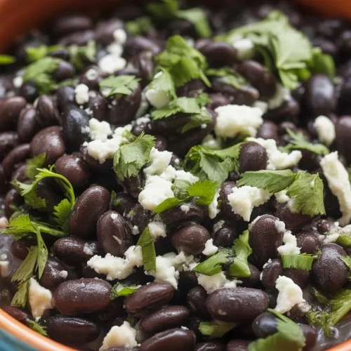 Delicious homemade black beans recipe with sautéed onions and spices.