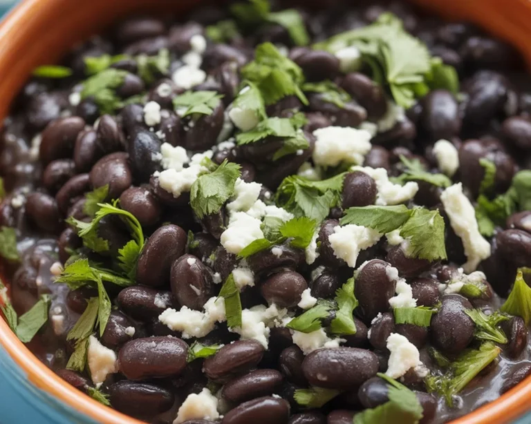 Delicious homemade black beans recipe with sautéed onions and spices.