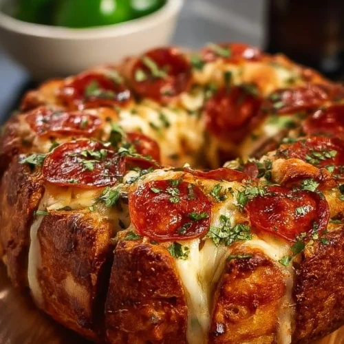 Delicious Pizza Monkey Bread with cheese and toppings, ready to be enjoyed