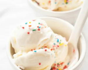 Delicious homemade snow cream made with fresh snow, milk, and vanilla extract.