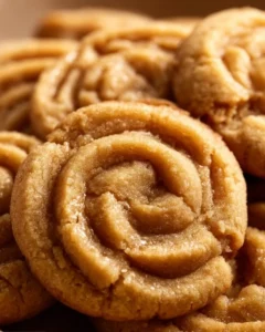 Thick and chewy peanut butter cookies on a plate