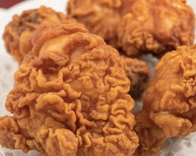 Crispy fried chicken cooked to golden perfection, ready to serve and enjoy.