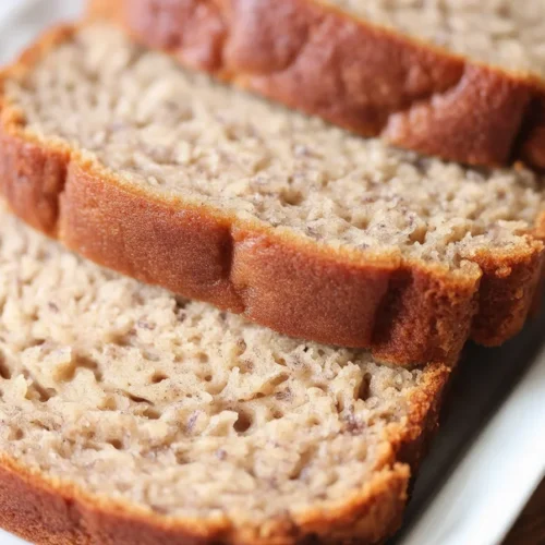 Delicious keto banana bread with almond flour, low carb, perfect for breakfast or snacks.