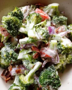 Delicious broccoli salad with lighter creamy dressing served in a bowl