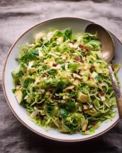 Fresh Brussels sprout salad with vibrant vegetables and a light dressing