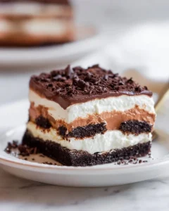 Delicious Chocolate Lasagna served on a plate with chocolate toppings