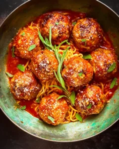 Homemade Grandma's meatball recipe with rich sauce and herbs