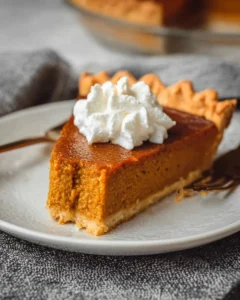 Delicious vegan pumpkin pie with a flaky crust and rich pumpkin filling