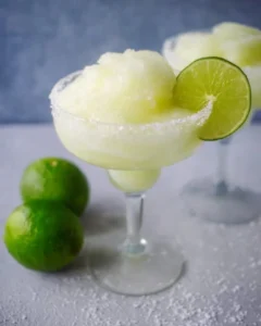 Classic frozen margarita in a chilled glass with lime garnish
