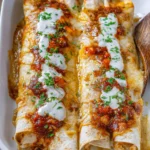 Delicious Instant Pot Chicken Enchiladas with creamy white cheese sauce