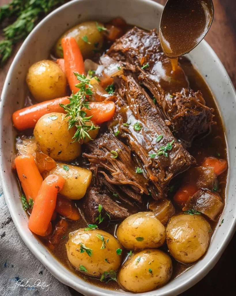 Easy pot roast with delicious gravy served on a plate