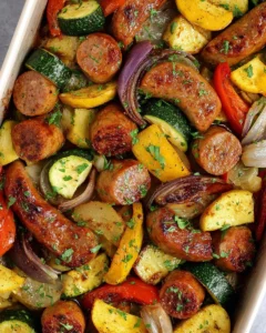 Sheet Pan Sausage and Veggies prepared with colorful vegetables