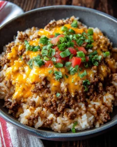 Delicious Cheesy Queso Ground Beef Rice served in a bowl