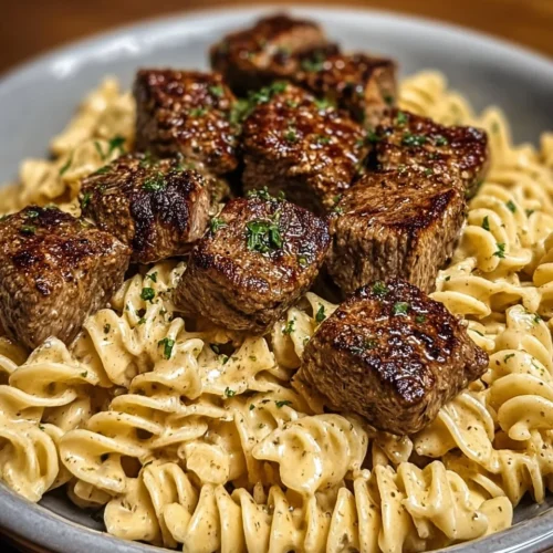 Creamy Garlic Butter Steak Bites with Spicy Cajun Alfredo Twisted Pasta 3 Creamy Garlic Butter Steak Bites with Spicy Cajun Alfredo Twisted Pasta