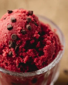 Delicious red velvet edible cookie dough in a bowl with toppings