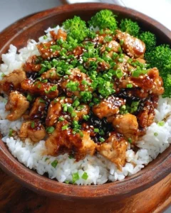 Delicious teriyaki chicken rice bowl with vegetables and sauce
