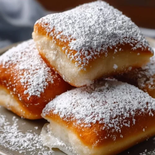 Delicious Vanilla French Beignets dusted with powdered sugar