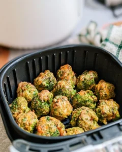 Crispy air fryer broccoli cheese bites served on a plate