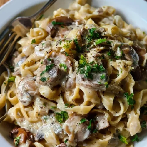 Creamy Garlic Mushroom Pasta 3 Creamy garlic mushroom pasta with fettuccine, Parmesan, and parsley