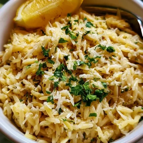 Garlic Butter Lemon Orzo 2 Delicious Garlic Butter Lemon Orzo with Parmesan served in a bowl