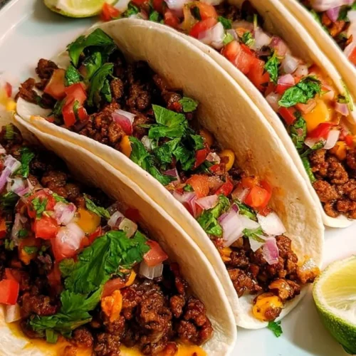 Build-Your-Own Ground Beef Taco Bar 3 Ground beef taco bar with seasoned beef, tortillas, and fresh toppings