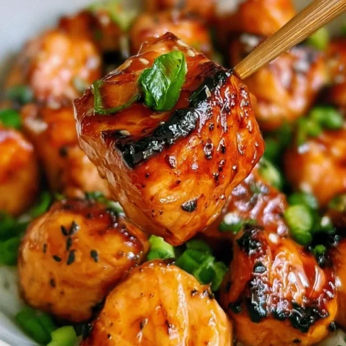 Miso Air Fryer Salmon Bites 2 Delicious miso air fryer salmon bites served on a plate with garnishes