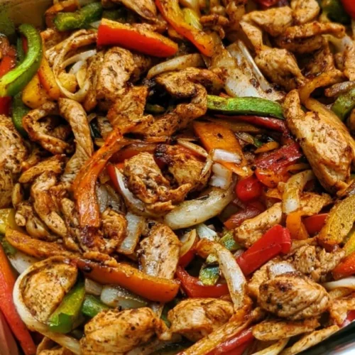 Oven-Baked Chicken Fajitas with Lime and Cilantro 2 Delicious Sheet Pan Chicken Fajitas with colorful peppers and spices.
