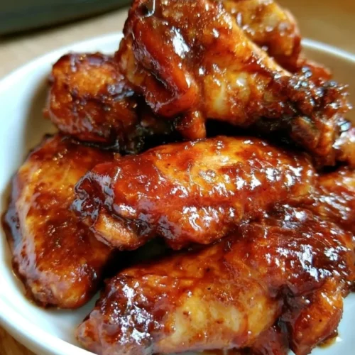Slow cooker barbecue chicken wings cooked to perfection with a tangy sauce