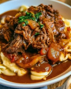 Slow Cooker Beef Manhattan served with creamy gravy and fresh herbs