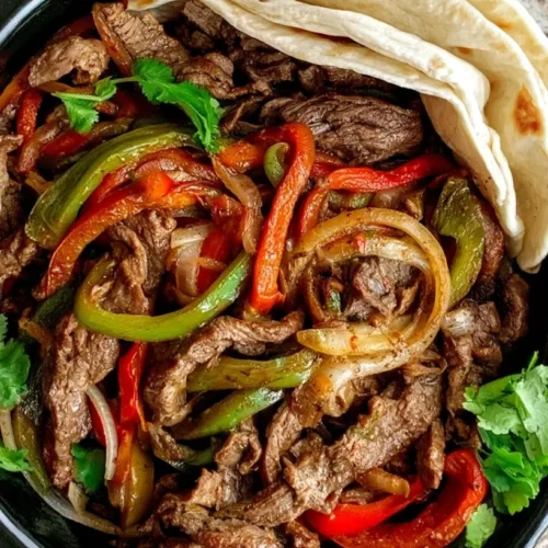 Slow Cooker Flank Steak Fajitas 2 Delicious slow cooker steak fajitas served with peppers and onions